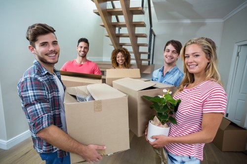 House removals planning in Barking with packed boxes and moving checklist
