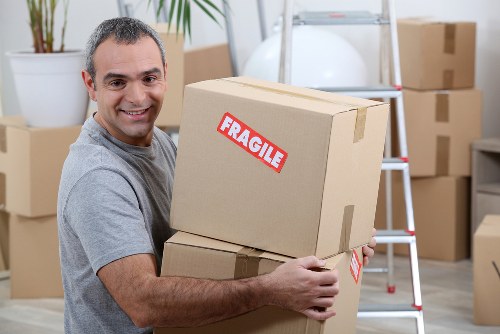 Packing supplies and labeled boxes for a Barking house move