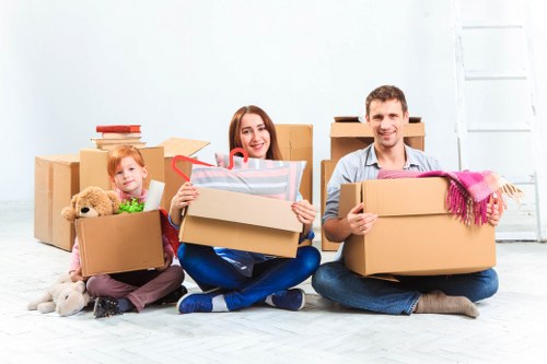 Man and van moving furniture in Barking residential area