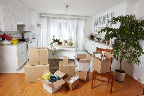 Organized storage unit in Barking with boxed belongings