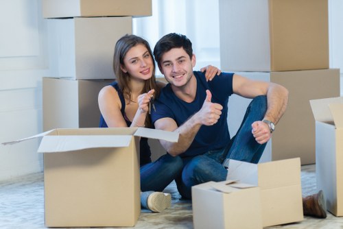 Organized middle-section storage space with stacked belongings in Barking